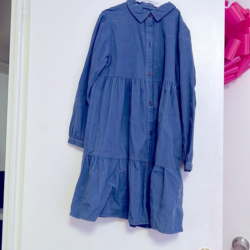 This is a cute blue button down dress!